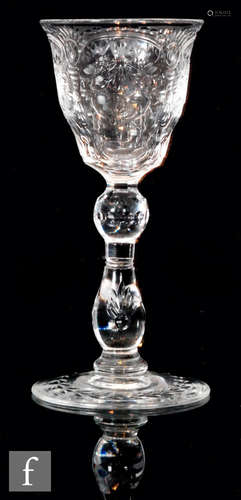 A late 19th Century Thomas Webb & Sons 'Rock Crystal' type drinking glass with ogee bowl decorated