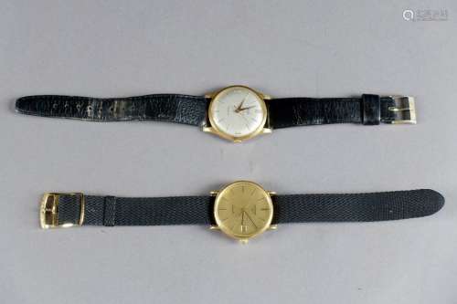 Longines et Helbi. Deux montres bracelet.