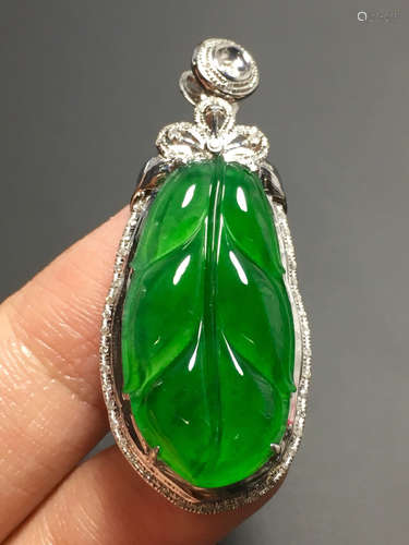 AN ICE SUN GREEN JADEITE LEAF PENDANT