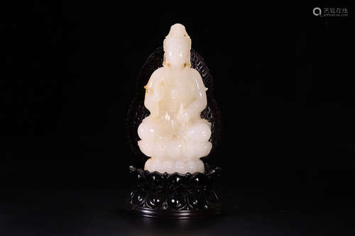 AN OLD HETIANJADE GUANYIN ORNAMENT