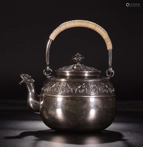 A SILVER POT WITH PHOENIX PATTERN