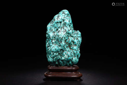 A TURQUOISE STONE MOUNTAIN SHAPED ORNAMENT