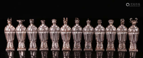 A SET OF TWELVE ZODIAC SIGNS  SILVER SULPTURES