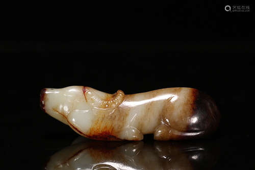 AN HETIAN JADE COW SHAPED ORNAMENT