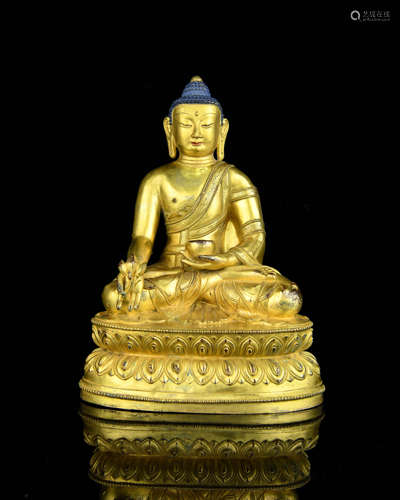 A Chinese Gilt Bronze Buddha