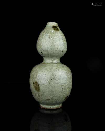 A Chinese Celadon Double-Gourd Porcelain Vase