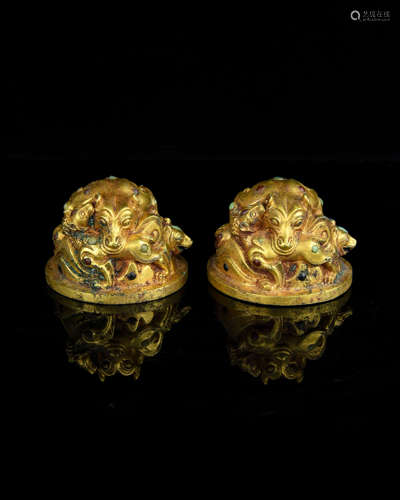 A Pair of Chinese Gilt Bronze Paper Weight