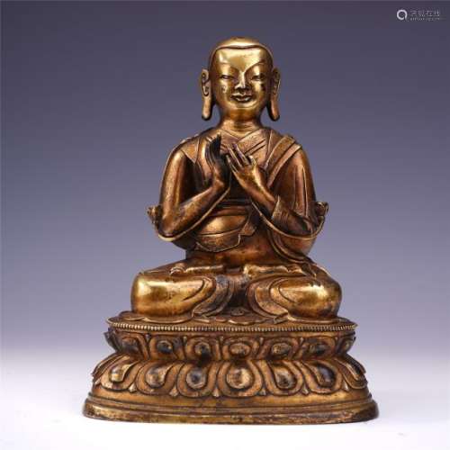 A Gilt Bronze Figure of Seated Guru