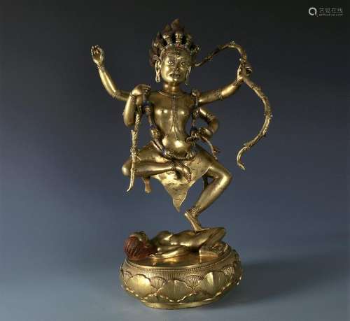 A Chinese Carved Gilt Bronze Figure of Dakini