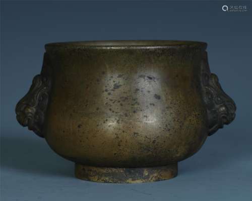A Chinese Carved Bronze Censer with Twin Lion Handles