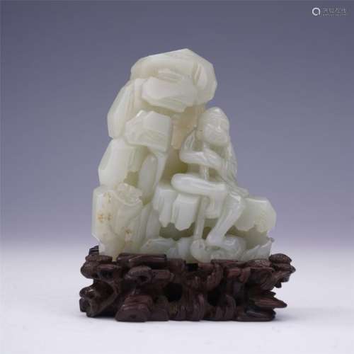 A Chinese Carved White Jade Mountain Boulder