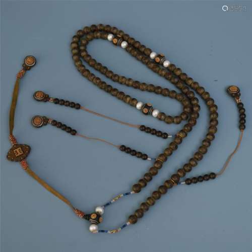 A Chinese Aloeswood Court Necklace Incised with Wan