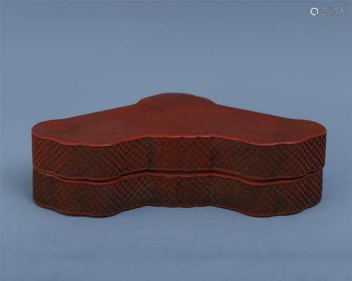 A Chinese Carved Cinnabar Lacquered Ruyi Box