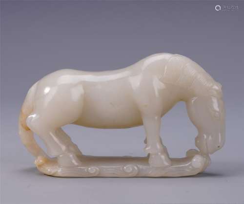 A Finely Carved White Jade Standing Horse Figure
