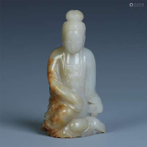 A Chinese White Jade Carving of A Seated Figure