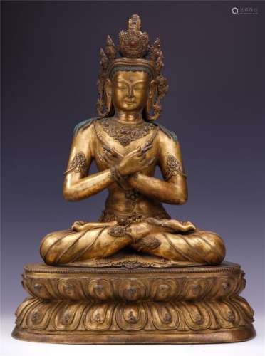 A Finely Carved Gilt Bronze Figure of Buddha with