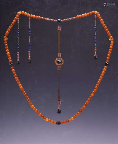 A Chinese Carved Amber Court Necklace