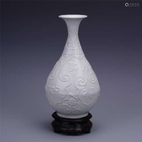 A Finely Carved Chinese blanc de chine 