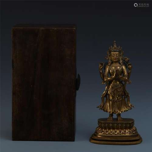 A Chinese Gilt Bronze Figure of Four-armed Guan Yin