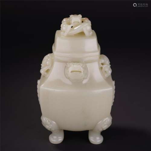 A Chinese Carved White Jade Vase with Dragon Finial