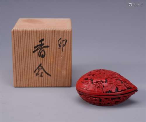 A Chinese Carved Cinnabar Lacquer Peach Formed Box