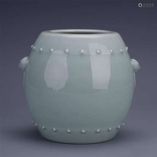 A Chinese Celadon Glazed Barrel-shaped Jar with Bosses