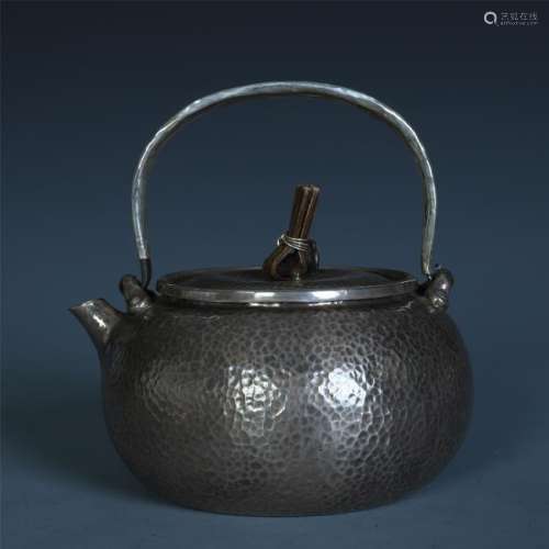 A Chinese Carved Silver Teapot