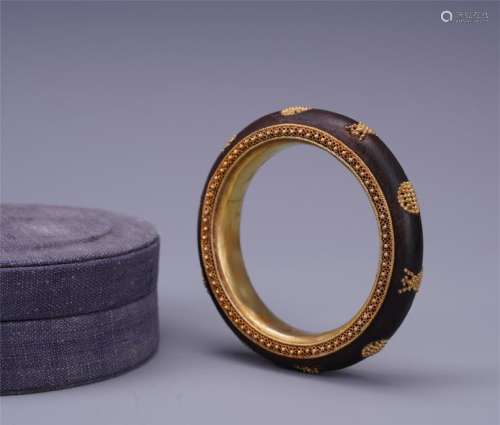 A Chinese Aloeswood Bracelet Inscribed with Gilt Bronze