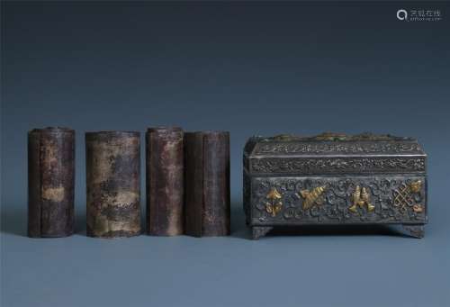 A Chinese Carved Silver Box and Books