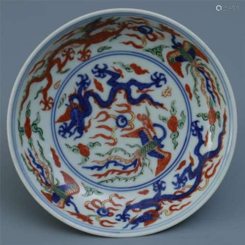 A Chinese Doucai Dish Carved with Dragon Motif