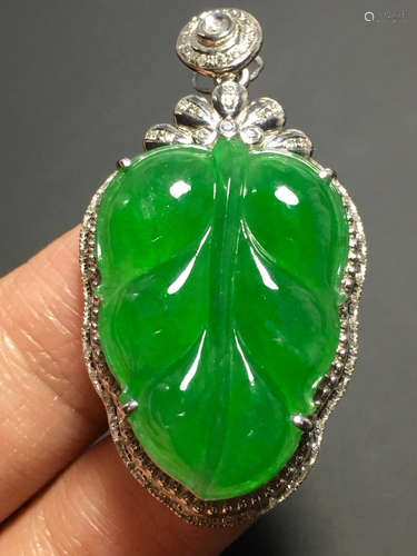 A GREEN JADEITE LEAF SHAPED PENDANT, TYPE A