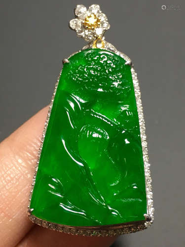 A GREEN JADEITE CARVED LANDSCAPE PENDANT, TYPE A