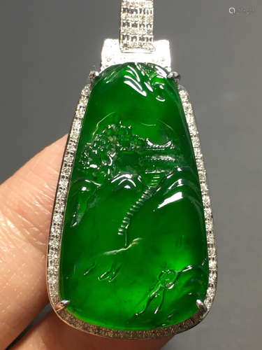 A GREEN JADEITE CARVED LANDSCAPE PAI PENDANT, TYPE A