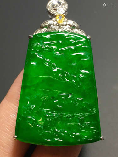 A GREEN JADEITE CARVED LANDSCAPE PAI PENDANT, TYPE A