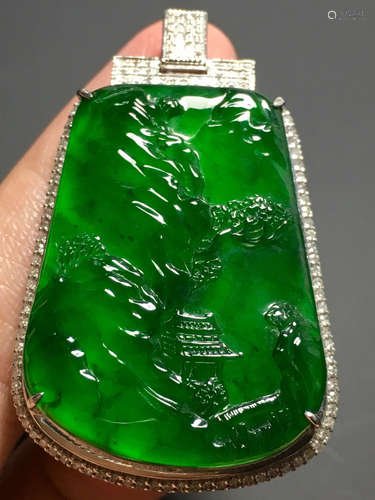 A GREEN JADEITE CARVED LANDSCAPE PENDANT, TYPE A