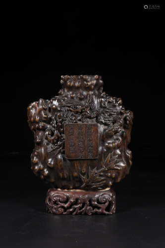 A CHENXIANG WOOD BURL SHAPED VASE WITH COVER