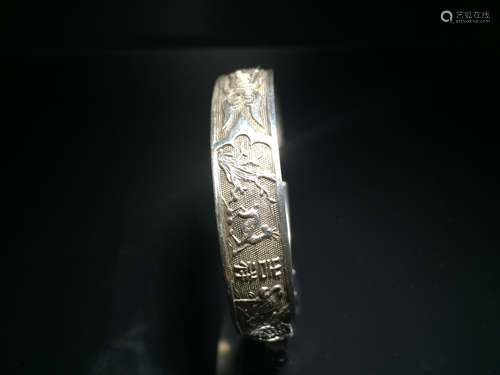 A SILVER BANGLE