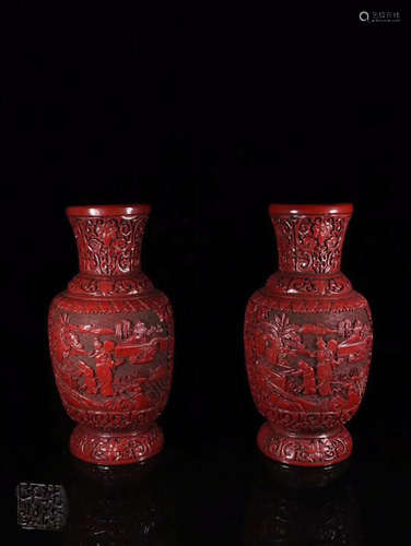 A PAIR OF STORY-TELLING RED LACQUER VASES