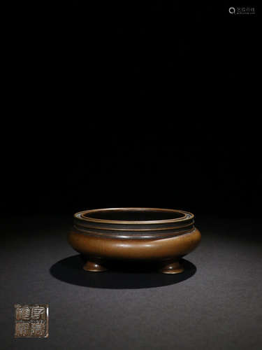 A PRECIOUS BRONZE TRI-LEG CENSER