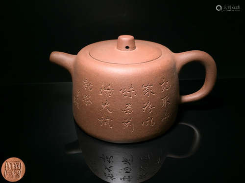 A MENSHENG MARK ZISHA TEAPOT WITH POETRY PATTERN