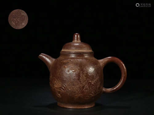 A ZISHA TEAPOT WITH PATTERN