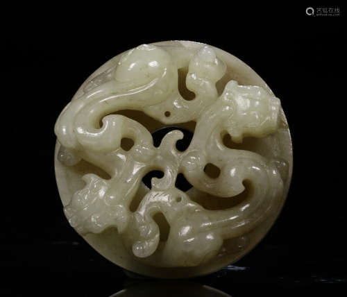A HETIAN JADE PENDANT WITH DRAGON CARVING