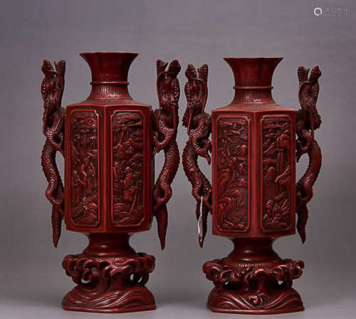 A WOOD HEXAGONAL VASE WITH DRAGON CARVED AND EAR