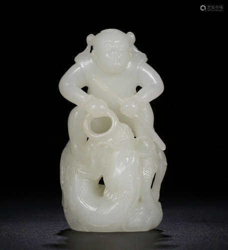 A HETIAN JADE ORNAMENT OF NEZHA SHAPED