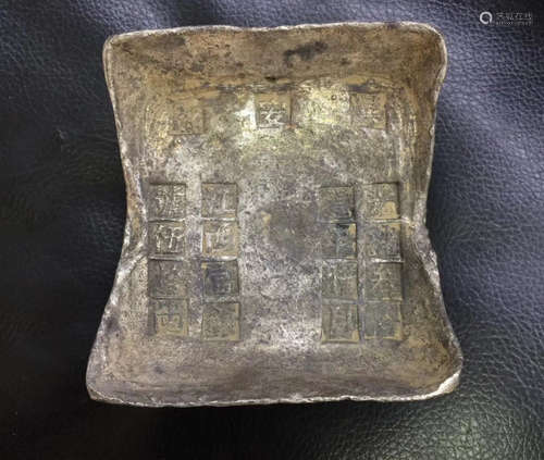 A QING DYNASTY SILVER INGOT