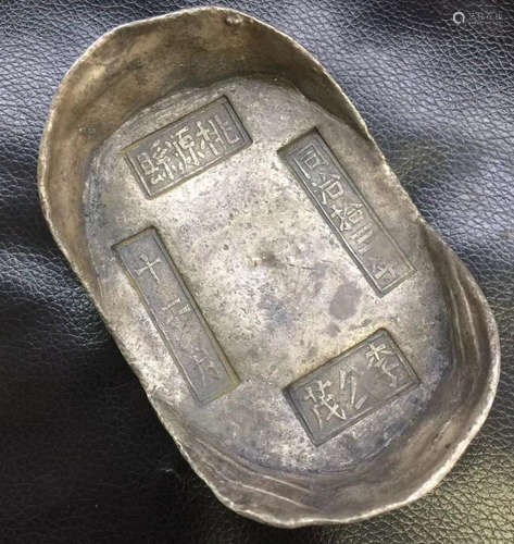 A QING DYNASTY STYLE SILVER INGOT