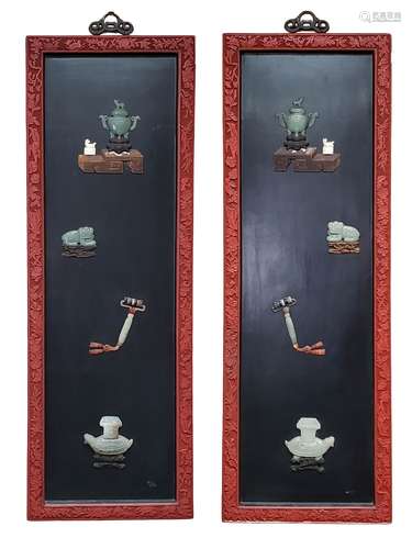 PAIR OF CINNABAR, CARVED STONE WALL PANELS