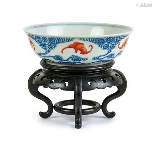 A CHINESE 'FIVE BLESSINGS' BOWL WITH WOOD STAND