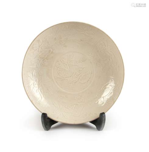 A CHINESE MOLDED DING DISH