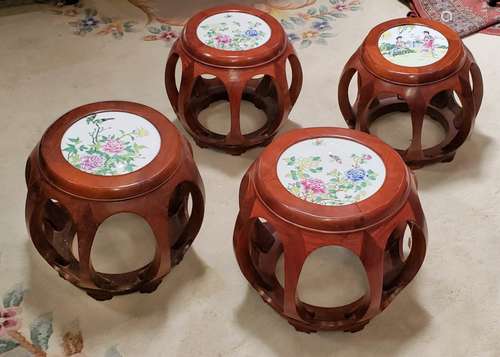 GROUP OF FOUR PORCELAIN TOPPED WOOD STOOLS